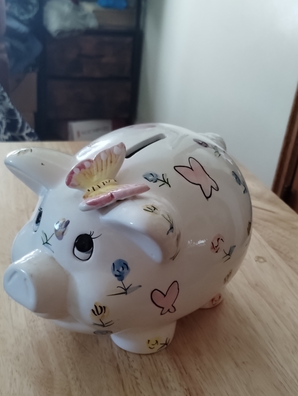 White Ceramic Piggy Bank with Pink Butterfly Accent